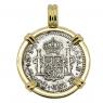 El Cazador treasure coin in gold pendant