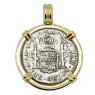 El Cazador treasure coin in gold pendant