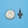 Cross size next to a Quarter