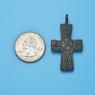 Cross size next to a Quarter